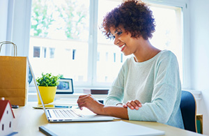 Woman checking her laptop