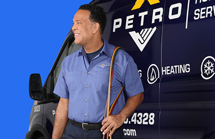 Service technician in front of van