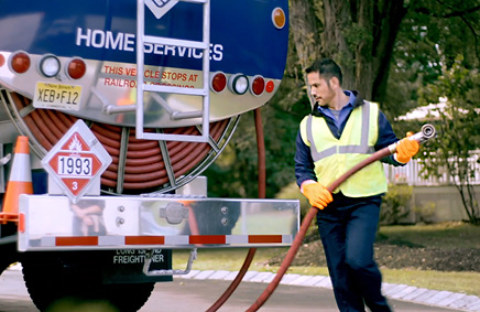 Petro service tech and oil truck