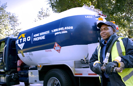 Petro service tech in front of propane truck