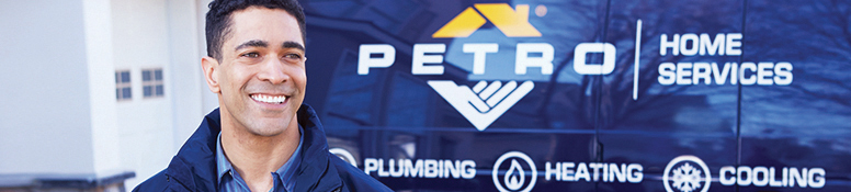 Petro employee in front of a truck