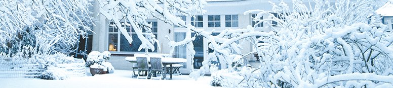 Snow covered house in the depths of winter.