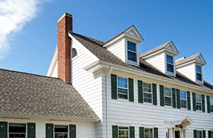 External view of a house with a prominent chimney