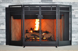 Gas fireplace with fake wooden logs and flames