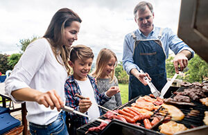 Family cooking BBQ