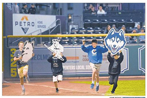 ai_hartford-ddfield Petro banner over fans running