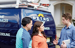 Petro service tech talking to couple