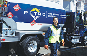 Petro service tech in front of propane truck