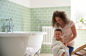 Bathroom using water from a tankless water heater