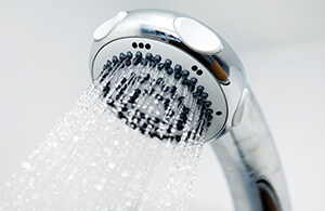 Hot water from a shower head