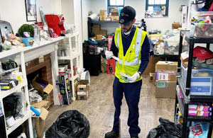 Volunteers sorting and packaging food supplies
