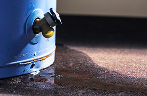 Image of a hot water tank leaking