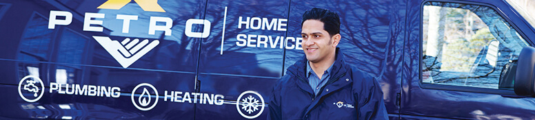 Petro service tech in front of van