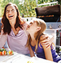 Mother and daughter laughing